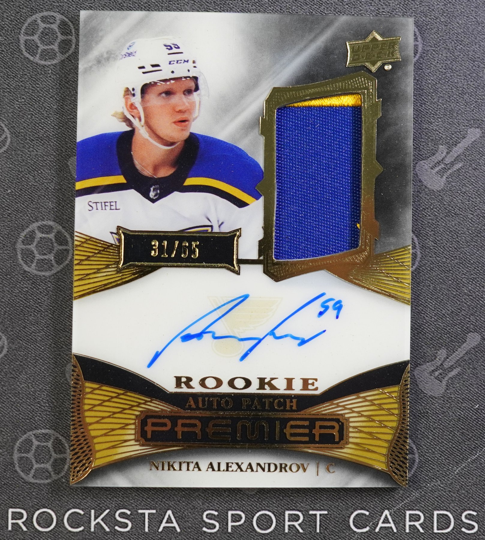 Лицевая сторона карточки Nikita Alexandrov — 2022/23 Upper Deck Premier — Rookie Auto Patch — #AR-NI — 31/65